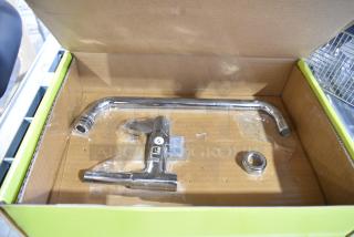 Brand new T&S Equip Faucet with minor scratches. Includes faucet body and spout in original box. SCP label visible.