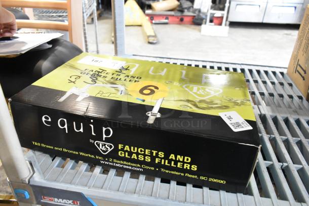 BRAND NEW SCRATCH AND DENT T&S Equip Faucet in box. Box shows "Equip by T&S" and includes product markings.