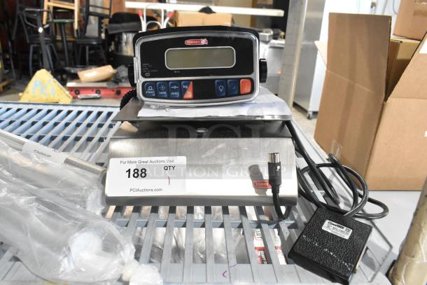 Brand new Torrey PPC5/10 10 lb. digital portion control scale with remote indicator and foot pedal, scratch and dent condition.