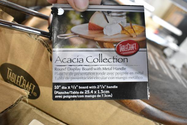 Tablecraft Acacia Collection Round Display Board with Metal Handle, 10" diameter, new with packaging tag attached.