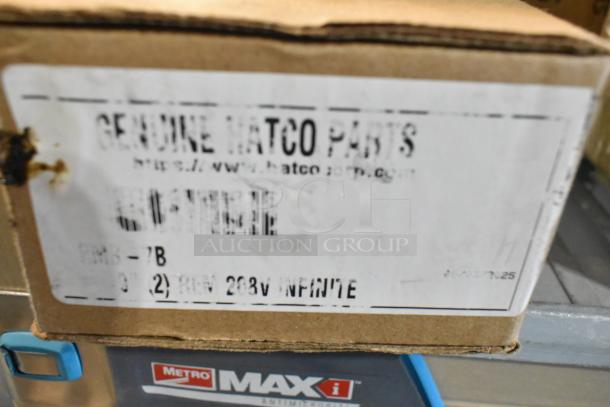 Cardboard box with partially visible label reading "GENUINE HATCO PARTS." Contains scratch and dent items by Avantco, Front of the House, and Tablecraft.