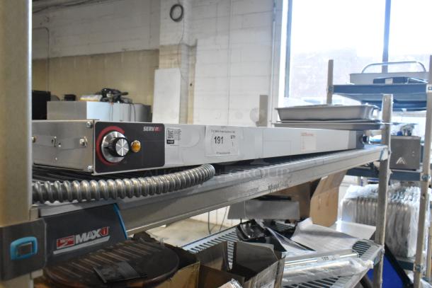 Brand new ServIt 423SW48INHDBLA 48" double strip warmer with dual infinite controls, 120V, 1 phase, on shelf.