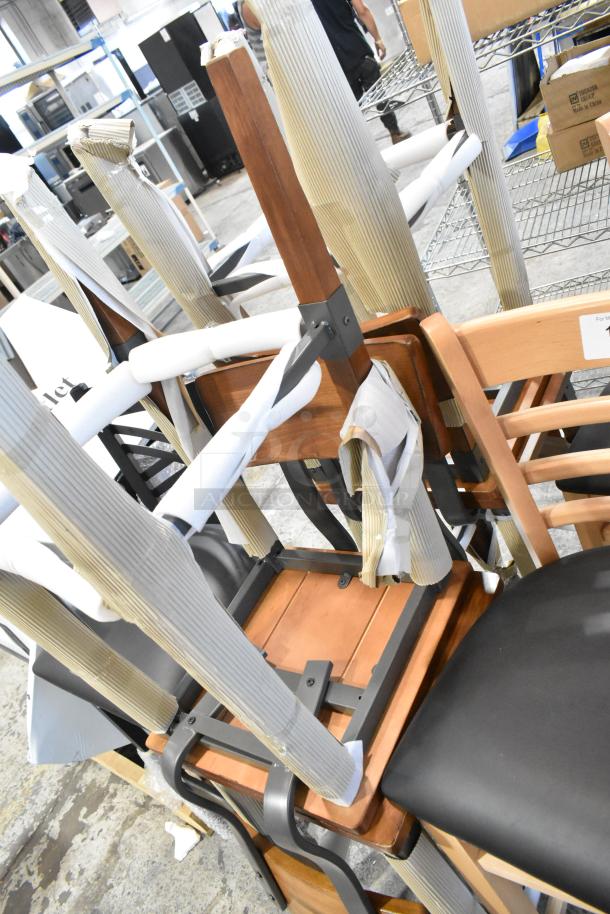 7 brand new bar height chairs, various styles, with minor scratches and dents, partly wrapped for protection.