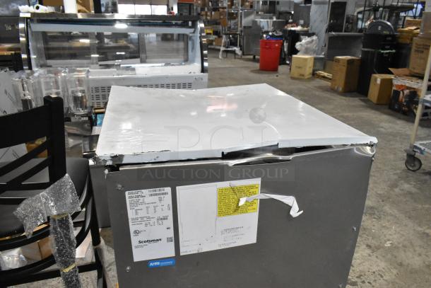 Brand new 2025 Scotsman HID525AB-1A countertop ice and water dispenser, stainless steel, minor top dents, 25 lb. bin storage.