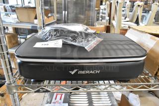 Brand new Merach MR-2439 Vibration Plate, minor scratches, includes accessories, displayed on shelf with auction tag.