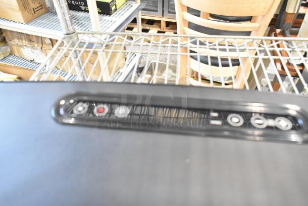 BRAND NEW SCRATCH AND DENT! Merach MR-2439 Vibration Plate, control panel detail, slightly blurred, shelving background.
