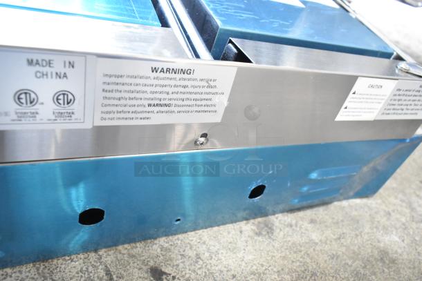 BRAND NEW Avantco 177PG400S stainless steel panini grill, dual smooth plates, 19 5/8" x 9 1/8" cooking surface. Labels showing.
