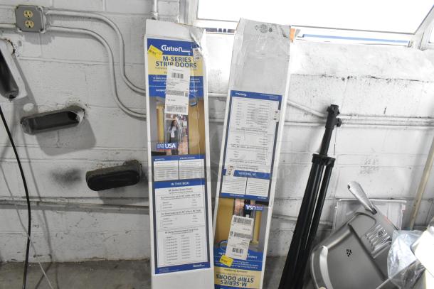 Brand new Curtron M Series Strip Doors, scratch and dent condition, in original packaging. Includes specifications and features.