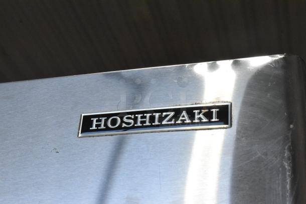 Hoshizaki F-1001MAH commercial ice head on bin, metal finish, 208-230V, 1 phase. Hoshizaki logo visible. Suitable for high-demand settings.