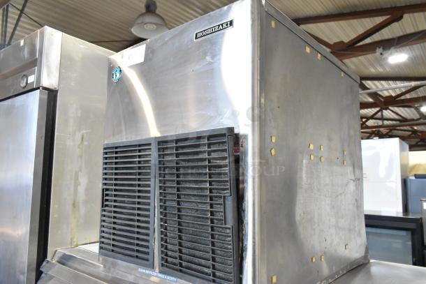Hoshizaki F-1001MAH commercial ice head on ice bin, 208-230V, 1 phase. Metal finish, visible brand label, used condition.