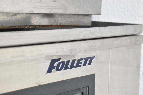 2 Hoshizaki F-1000MRB ice heads on Follett LSG1 ice bin, metal construction, 208-230V, 1 phase, visible Follett logo.