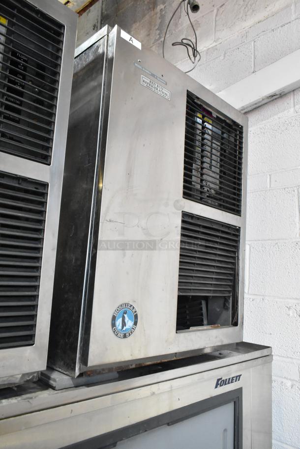 Two Hoshizaki F-1000MRB metal ice heads on Follett LSG1 bin, 208-230V, 1 phase, used commercial setup.