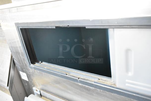 2 Hoshizaki F-1000MRB ice heads on Follett LSG1 bin; metal, commercial grade, 208-230V, 1 phase, visible wear, open lid.
