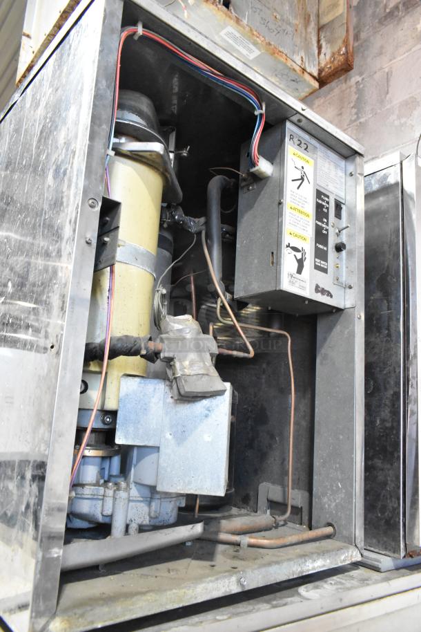 2 Hoshizaki F-1000MRB ice heads on Follett LSG1 ice bin, visible wiring and labels, 208-230V, 1 phase, commercial use.
