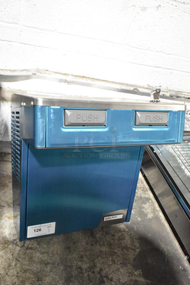 Brand new Halsey Taylor HTHBHACG8NF_1D wall mount water fountain with bottle filling, 115V, minor scratches, push buttons visible.