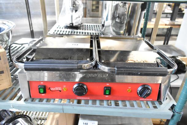 Brand new Avantco 177PG400 stainless steel dual panini grill, grooved plates, 19 5/8"x9 1/8" surface, 120V, 1 phase.
