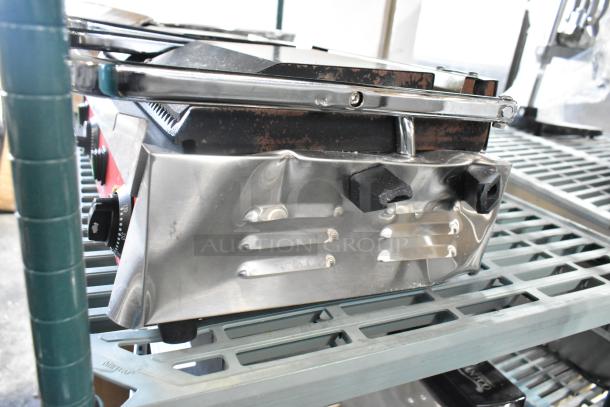 Brand new Avantco 177PG400 stainless steel commercial panini grill, minor dents, dual grooved plates, 19 5/8" x 9 1/8".