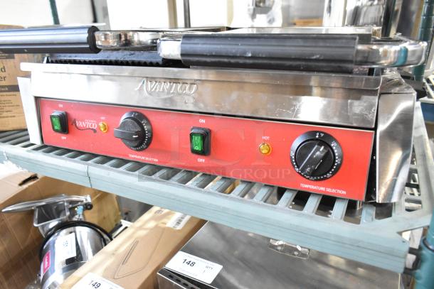 Brand new Avantco 177PG400 stainless steel dual panini grill, grooved plates, 19 5/8" x 9 1/8" surface, 120V.