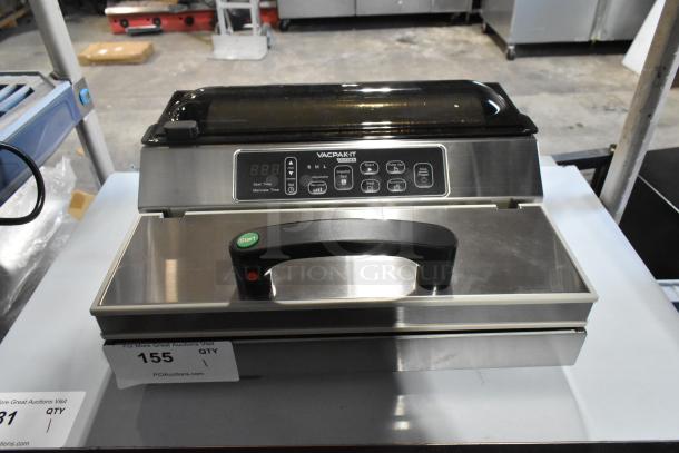 Brand new VacPak-It UVME12SS vacuum packing machine with 12" seal bar, dual piston dry pump, and roll cutter.