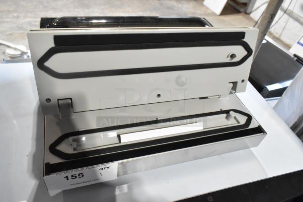 BRAND NEW VacPak-It UVME12SS Vacuum Packing Machine with 12" seal bar, roll cutter, dual piston dry pump, slight cosmetic scratches.