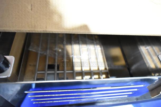 Brand new Chef Master 90217 stainless steel butane stove cover, 7 3/16" x 14 1/2" x 12", with minor scratches and dents.