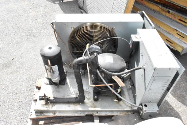 Bally Walk In Box with BEHA015E6-HS2B-B 208-230V compressor, Bally evaporator fan. Used condition, visible wiring and components.