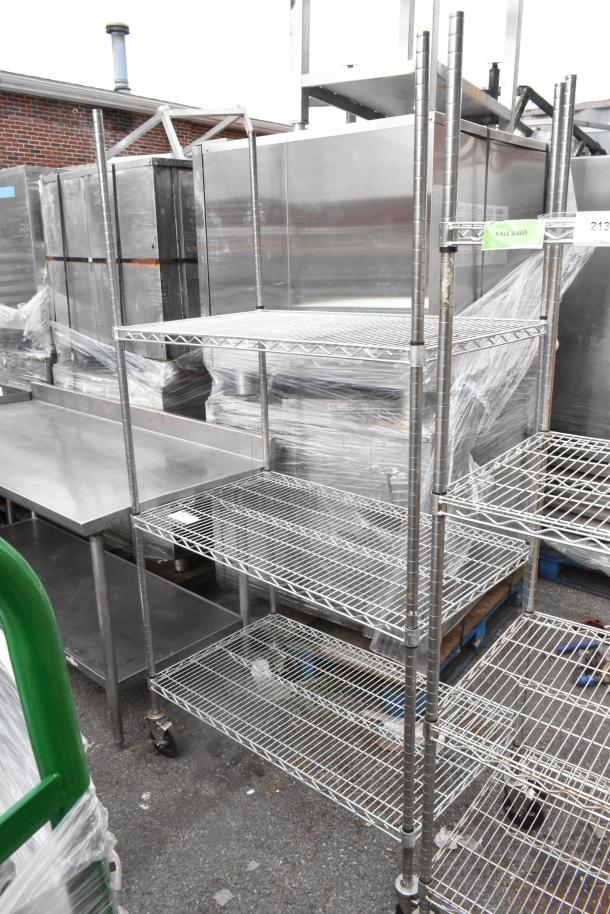 Chrome finish 3-tier wire shelving unit with commercial casters. Buyer must dismantle. Consider freight charges.