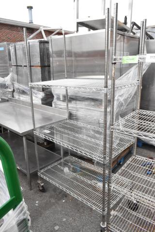 Chrome finish 3-tier wire shelving unit with commercial casters. Buyer must dismantle. Consider freight charges.