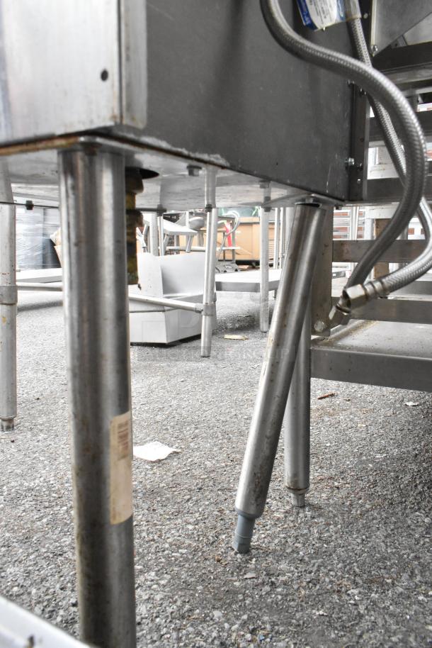 Perlick stainless steel single bay sink, sturdy legs, visible hose connections, used condition.