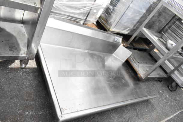 Advance Tabco DTC-S30-48L stainless steel dishwasher table, left side clean, no legs, slightly worn condition.