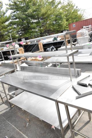 Stainless steel table with under shelf, two-tier over shelf. Polished finish, sturdy design, ideal for commercial use.