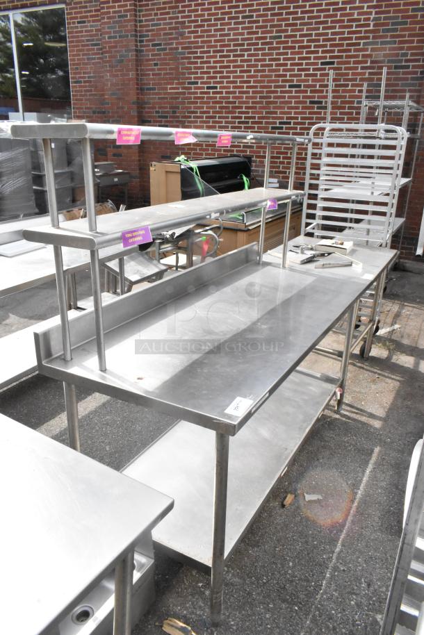 Stainless steel table with under shelf, two-tier over shelf, and labeled sections. Ideal for catering, good condition.