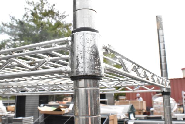 Chrome 3-tier wire shelving with commercial casters. NSF Eagle Shelving, USA patent 5,390,803. Buyer must dismantle.