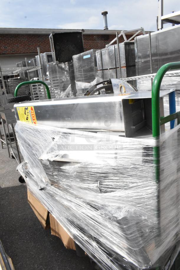 Uline green metal U-Boat cart on casters, wrapped, includes a sous vide and metal chafer frame, in used condition.
