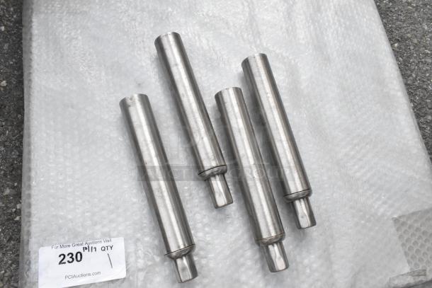 Winco Metal U Shelf, four cylindrical metal parts on bubble wrap, in good condition. Auction tag reads "230, PCI Auctions".