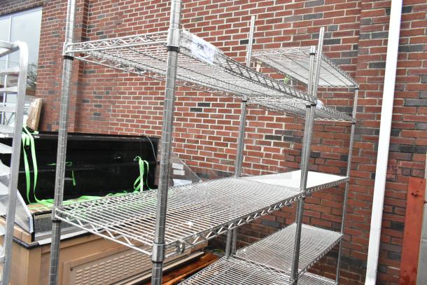 Chrome finish 4-tier wire shelving unit on commercial casters, excellent condition. Buyer must dismantle. Consider freight.