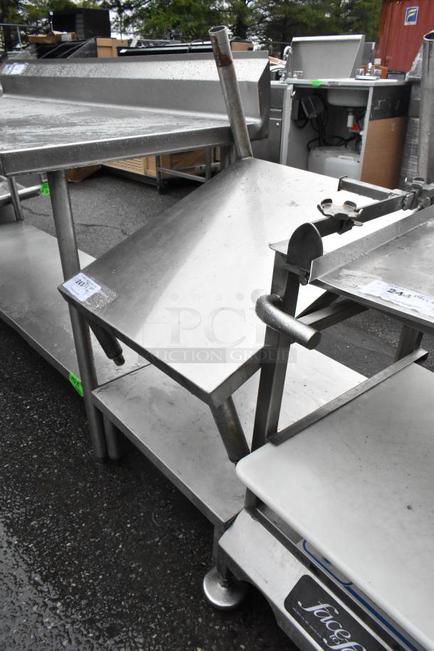 Metal 2-tier shelf, stainless steel, industrial design, visible wear, label reads "LOT 801", sturdy construction.