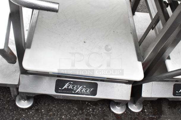 Face to Face stainless steel commercial meat slicer equipment stand, sturdy design, white top, brand label visible.