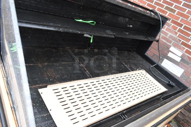 Killion PFW-74-43-48-V-N-MOBILE metal open merchandiser, 208/230V, 1 phase. Features metal shelves, minor wear visible.