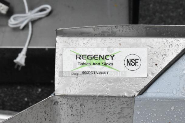 Regency 3-compartment sink model 600DDTS384RT tag, shown wet. NSF certified. Scratch and dent condition.