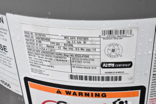 Rheem XG50T06PV42U0 commercial water heater, natural gas, 50-gallon, 42,000 BTUH, ANSI certified, manufactured Oct 2015.