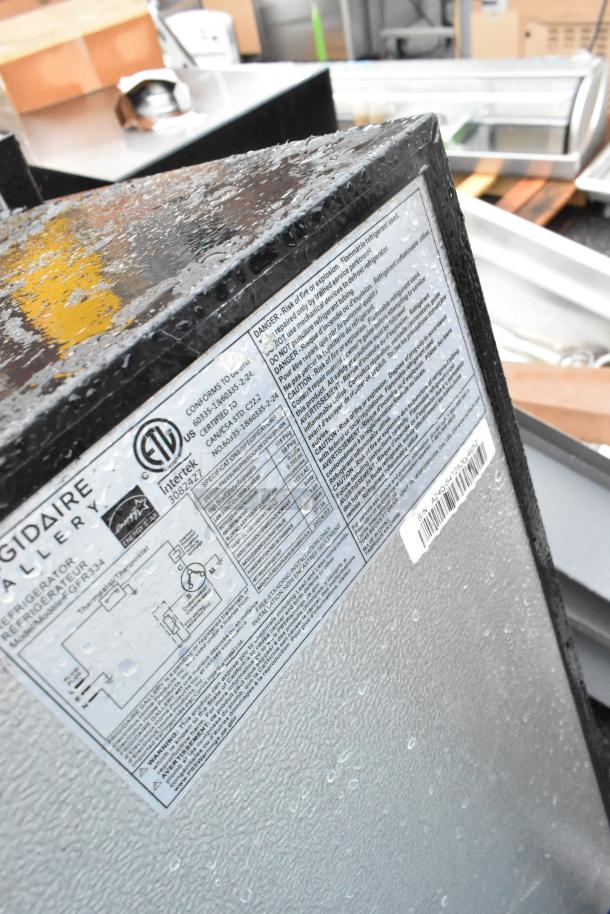 Four mini coolers including Frigidaire GFR334 with label detail, showing specifications and certification marks. 120V, 1 phase.