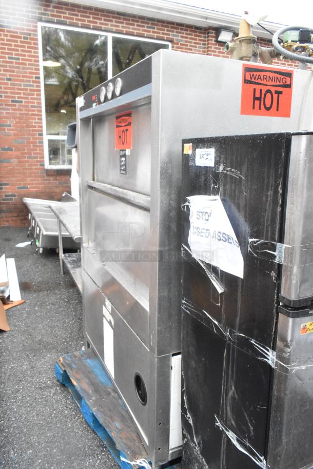 Douglas SD-20-E-480/3 stainless steel commercial pot and pan washer, front load, 480V 3-phase, used, "HOT" warning labels visible.