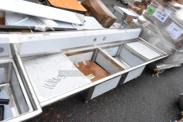 Brand new Regency 600S22323224 16-gauge stainless steel two-compartment sink with galvanized legs, 2 drainboards. Scratch and dent condition.