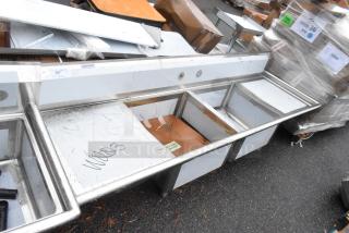 BRAND NEW SCRATCH AND DENT! Regency 600S22323224 16 Gauge Stainless Steel Two Compartment Sink with Galvanized Steel Legs and 2 Drainboards - Item #1213600