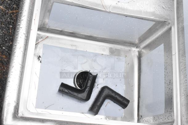 Regency 600S1162018L stainless steel single bay sink, new with scratches, includes left side drain board, no legs.