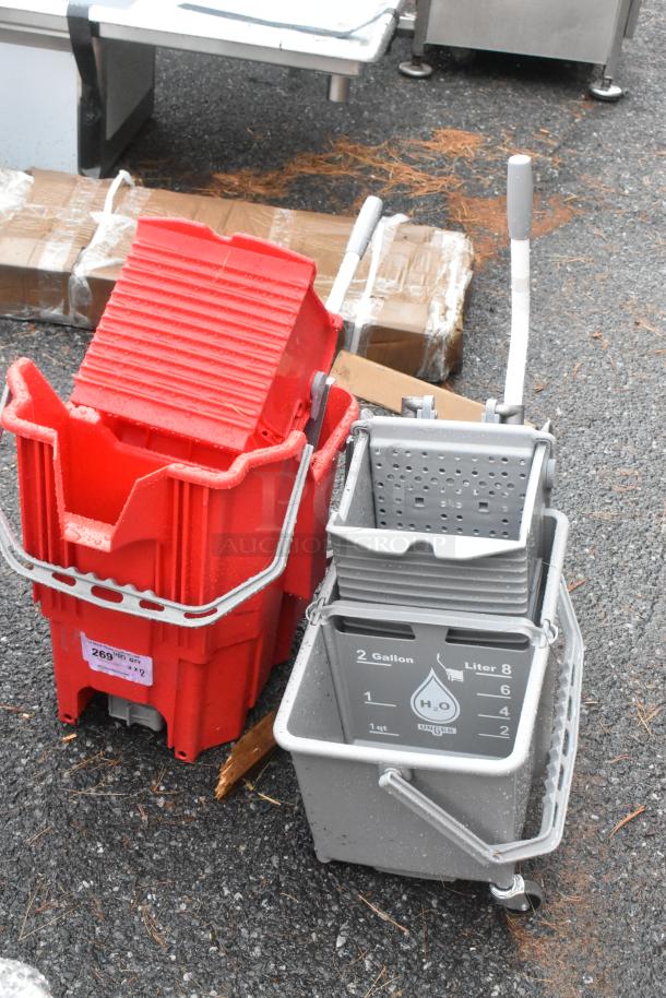 Two brand new scratch and dent poly mop buckets; one red, one gray with measurement markings.