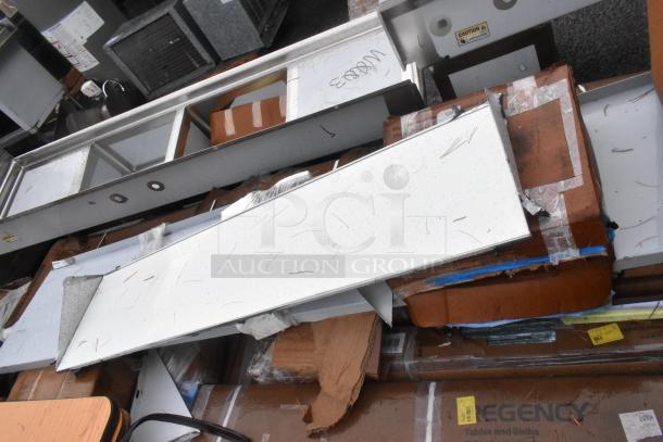 10 new scratch and dent items, including Regency stainless steel double deck overshelf and more, various conditions.
