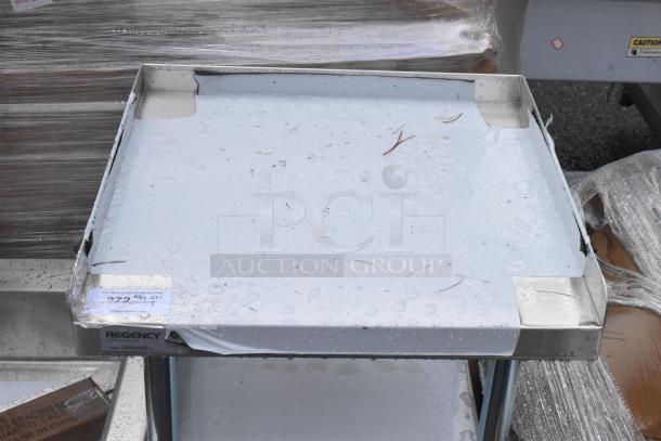 BRAND NEW Regency 600ES2424GK 24" x 24" 16-gauge stainless steel equipment stand with galvanized undershelf and casters, scratch and dent.