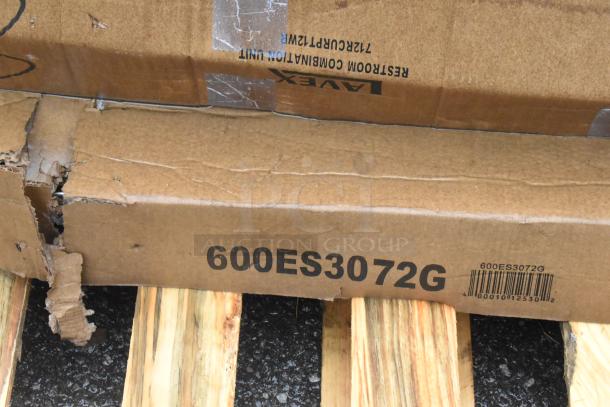 Cardboard box labeled 600ES3072G with visible tears, indicating a Regency 30" x 72" stainless steel equipment stand.